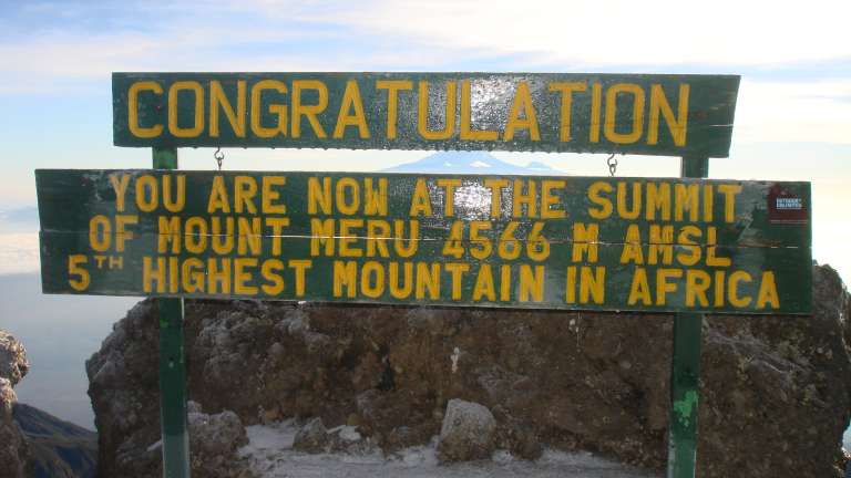 Signage on top of Mt Meru